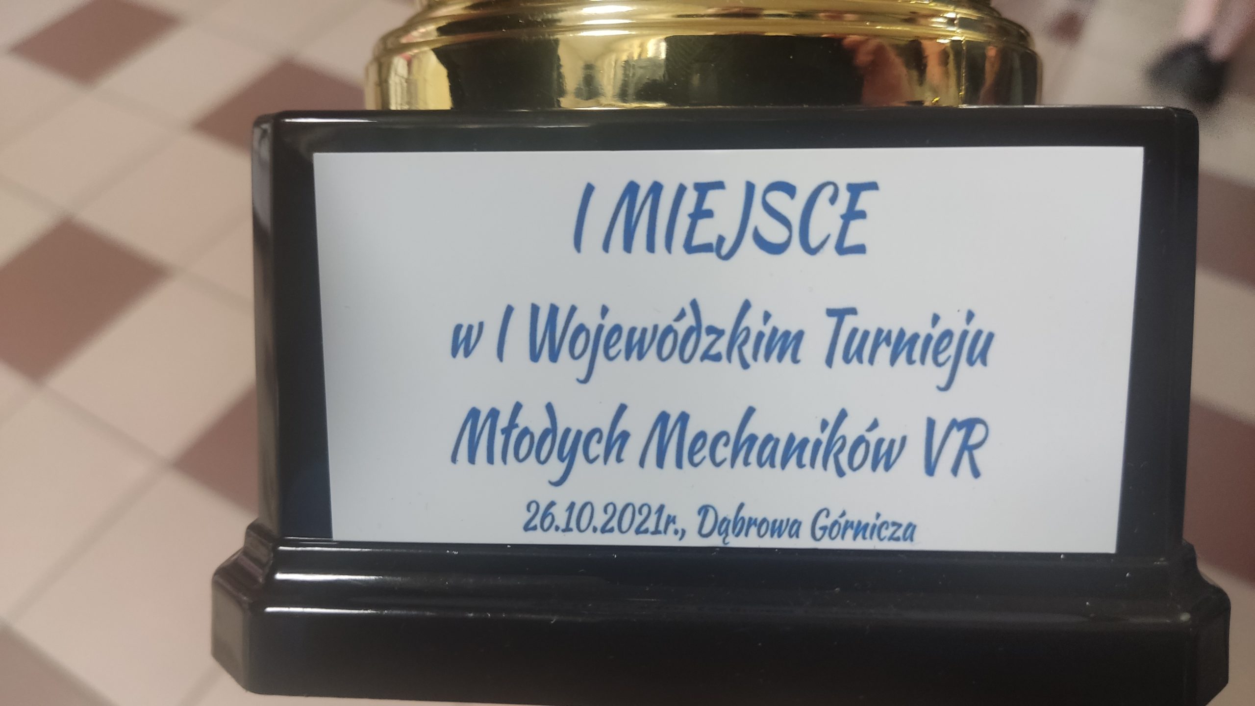 opis na statuetce o zajęciu I miejsca